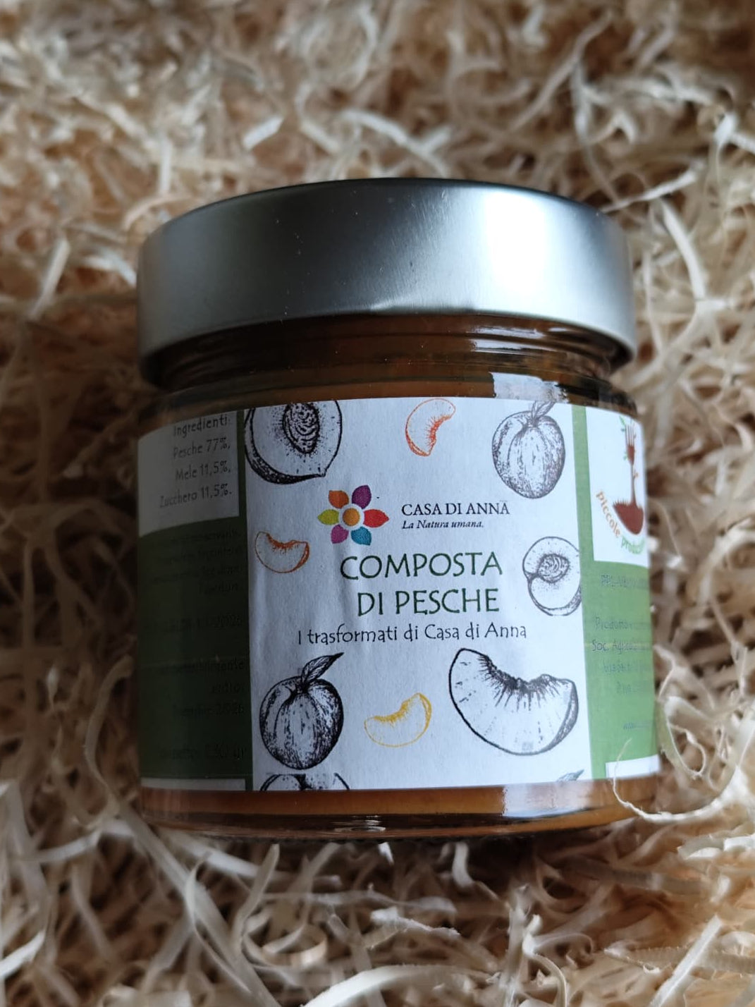 Composta di PESCHE (77%) Peso: 230g